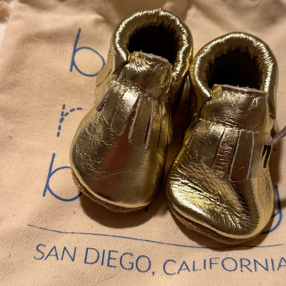 EUC Gold Bird Rock Baby Moccasins